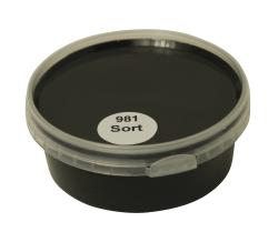 Billedet viser en rund farveprøve bøtte med maling i en ensartet, livlig og klar sort farve. Overfladen fremstår dækkende og jævn, hvilket giver et realistisk indtryk af farvens udtryk på malede overflader. Farveprøven anvendes til at vurdere nuance, dækkeevne og finish før valg af maling til større projekter. Den sort farve repræsenterer en af de farvenuancer, som findes i udvalget af træbeskyttelse.